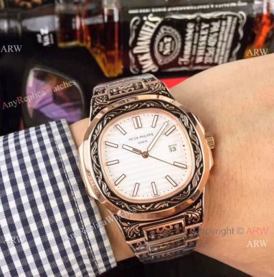 Clone Patek Philippe Nautilus White Face Rose Gold Tattoo Watch 40mm